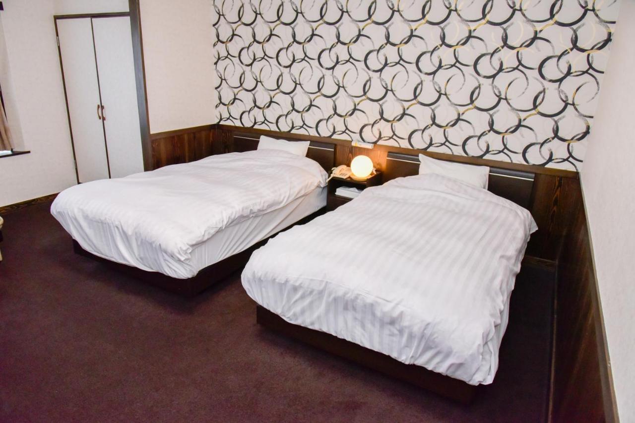 Aso Hotel Luaran gambar
