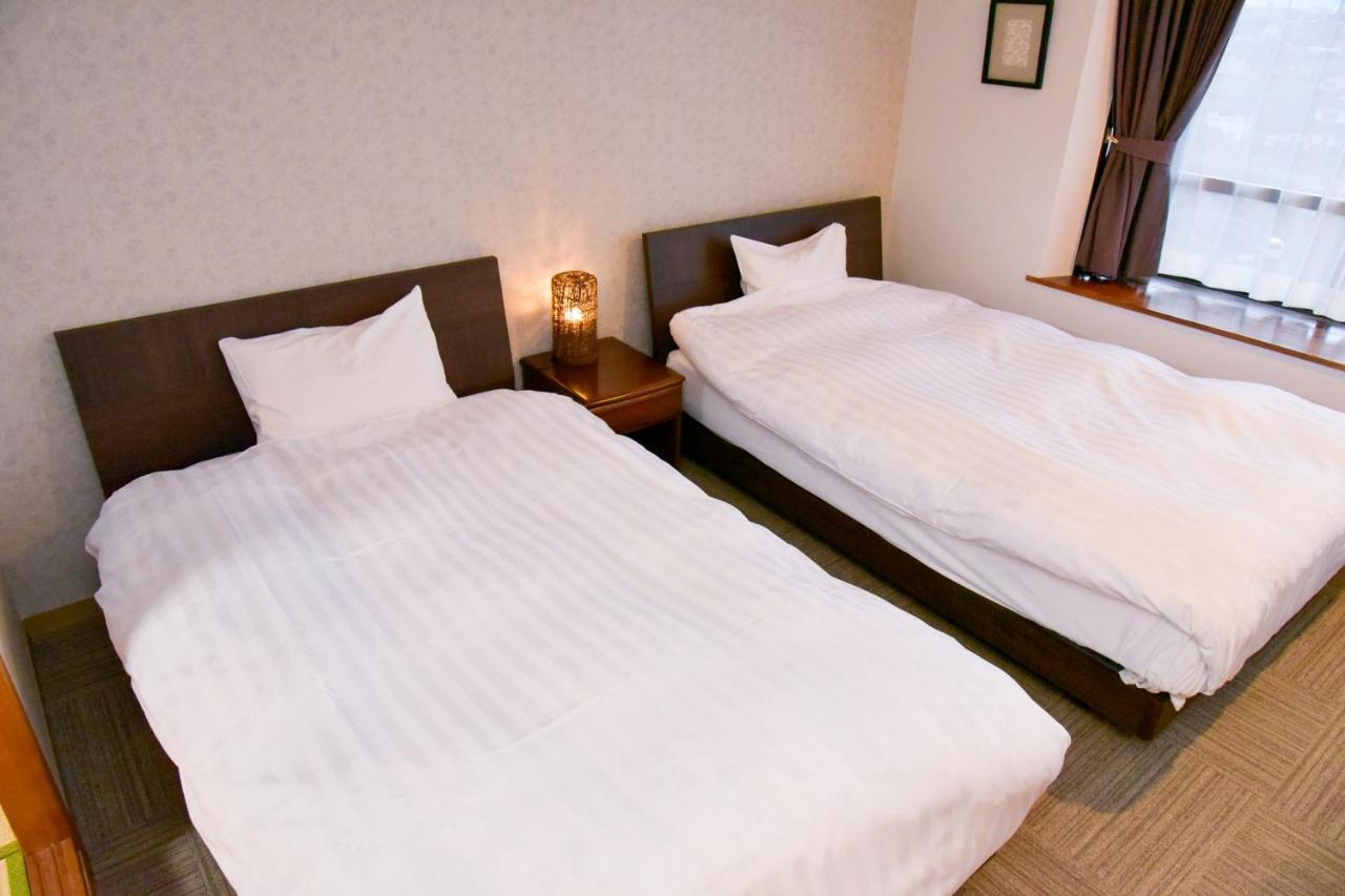 Aso Hotel Luaran gambar