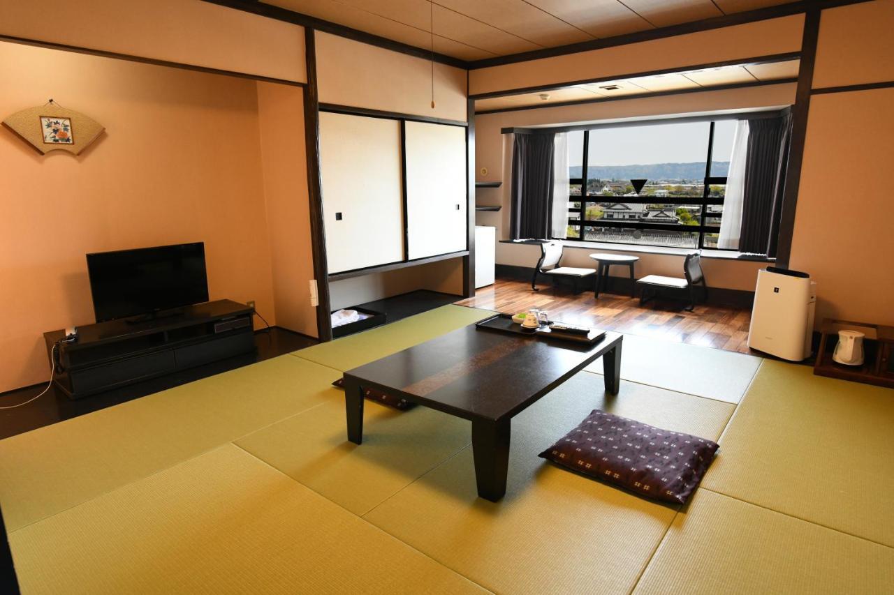 Aso Hotel Luaran gambar